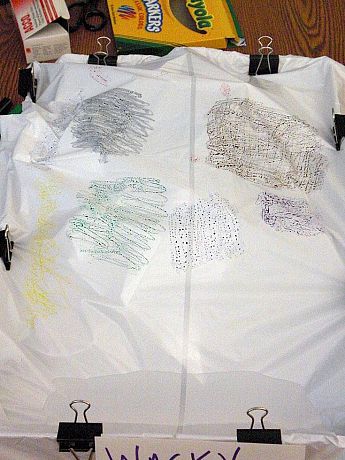 Use plastic stretched over crumpled paper to create topography, then color sections of the plastic with washable markers to illustrate different land uses. (Image credit: Claire Sargo)